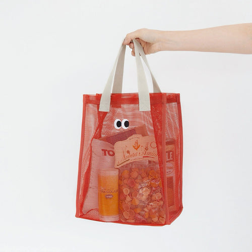 Borsa shopper in rete con occhi finti